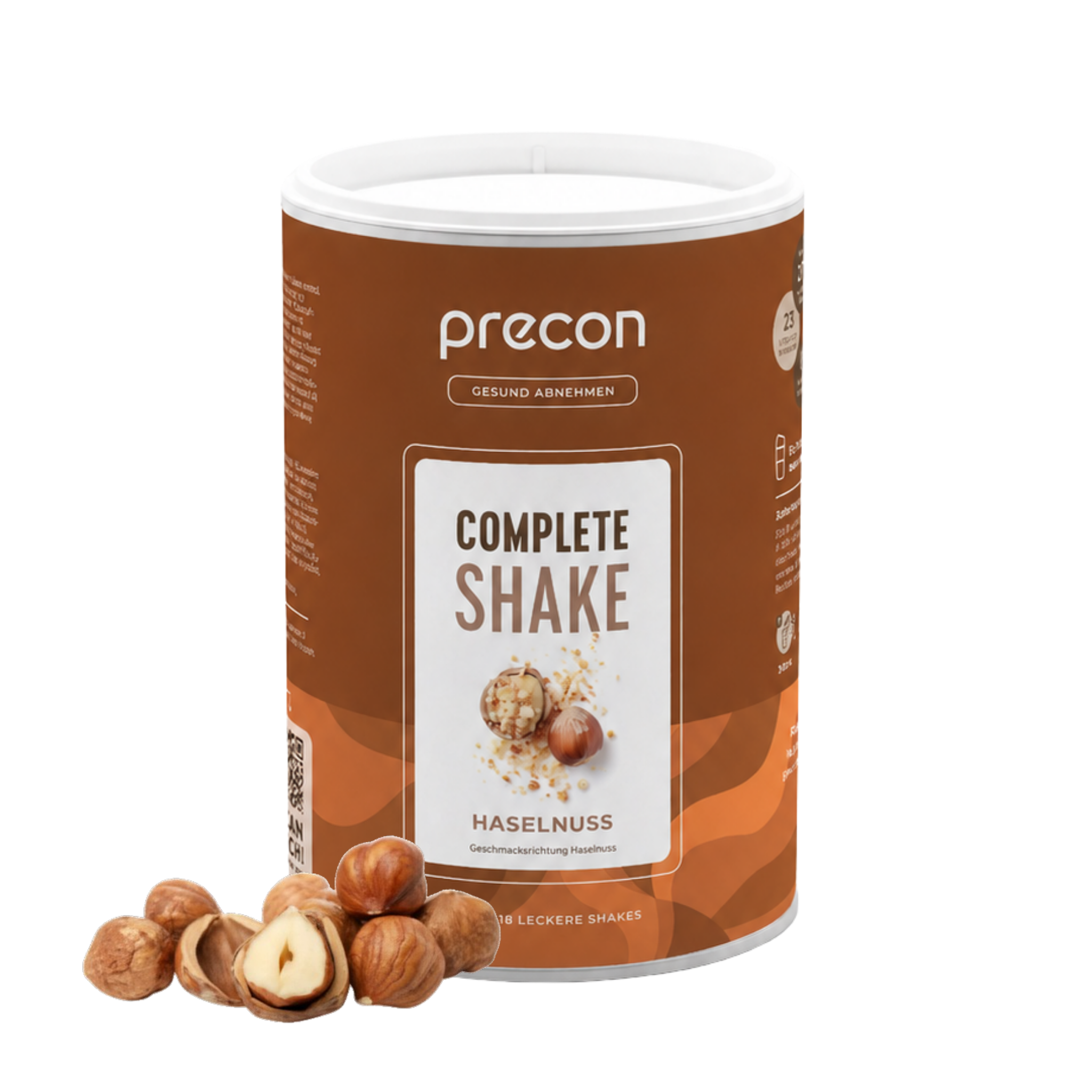 Ein Behälter mit „Anona GmbH Complete Shake Haselnuss“ steht aufrecht, davor sind auf weißem Hintergrund mehrere ganze und geschälte Haselnüsse angeordnet.