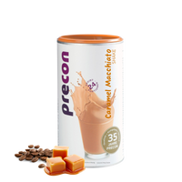 Abgebildet ist ein Kanister Anona GmbH Caramel Macchiato Shake mit einer Spritzer-Grafik des Shakes in einem Glas, Karamellwürfeln und Kaffeebohnen daneben auf weißem Hintergrund.